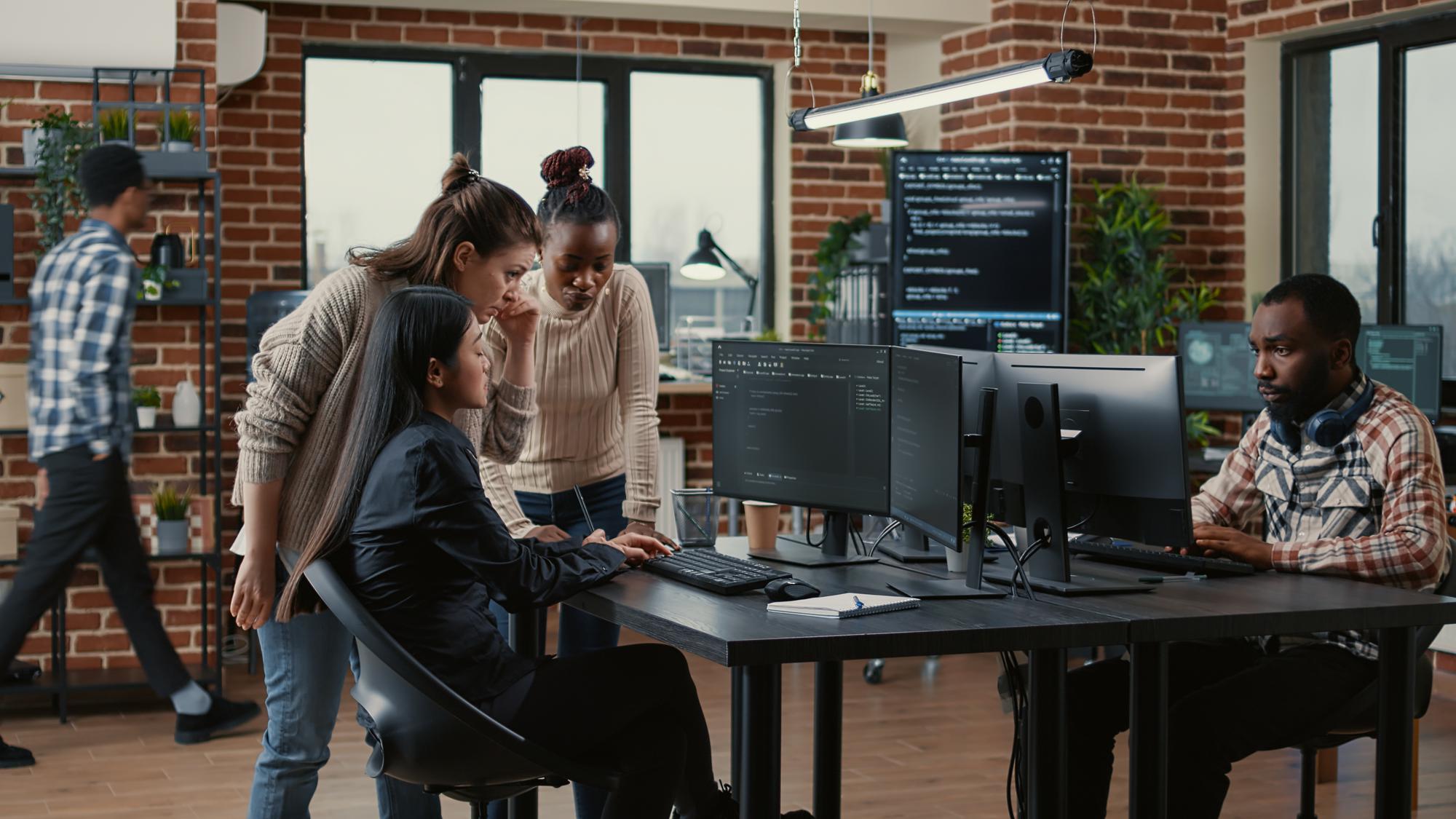 HAWKFlex team collaborating with a client on a digital project